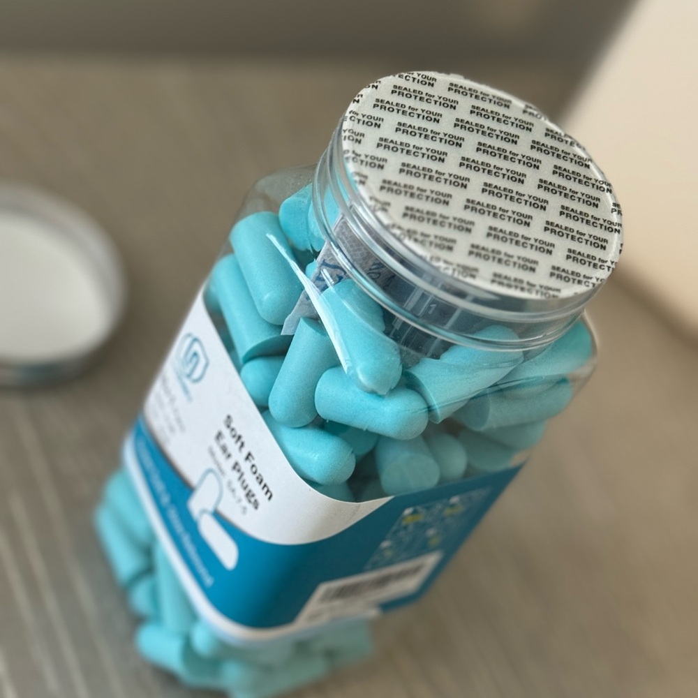 Blue Ear Plugs in Clear Plastic Jar
